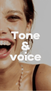 Screenshot of a Video Pin that shows a closeup of a woman laughing. Text overlay says "Tone & Voice".